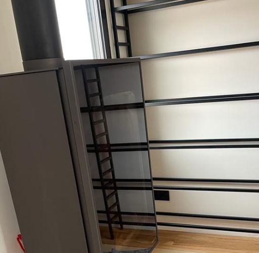 Protección metálica de diseño para chimenea instalada por Aluminis Samar